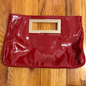 Michael Kors red patent clutch